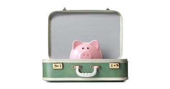 piggy bank in luggage