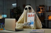 Boo! A Financial Ghost Story Ghost with financial sheet