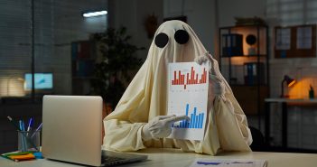 Ghost with financial sheet
