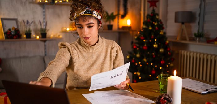 Person looking over their finances