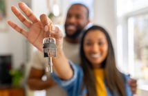 Couple holding house keys