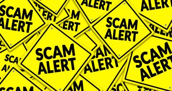 Scam alert text displayed in a yellow symbol