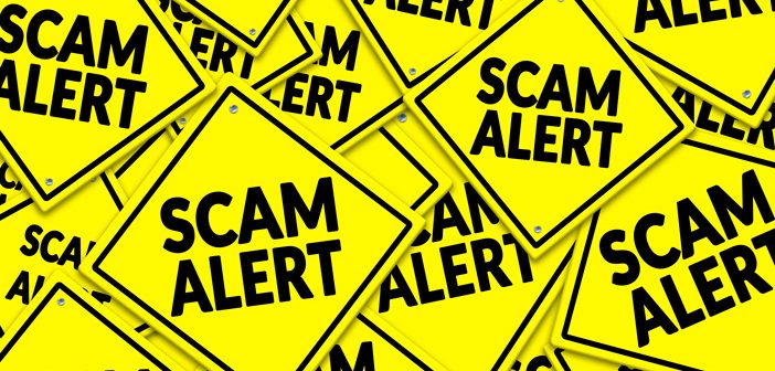 Scam alert text displayed in a yellow symbol
