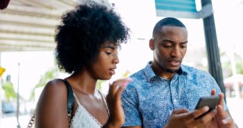 Couple looking at their phone