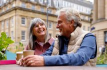 Couple talking having coffee