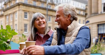 Couple talking having coffee