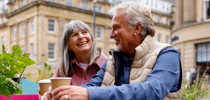 Couple talking having coffee